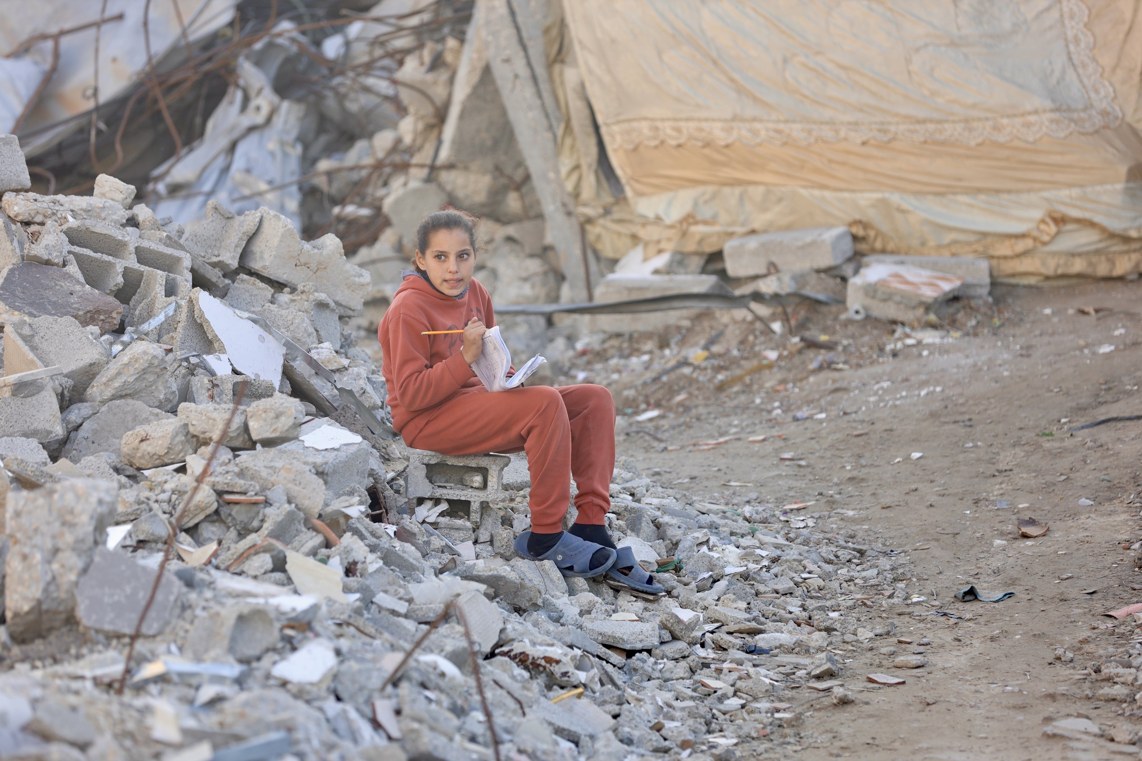 EDUCATION THROUGH THE RUBBLE